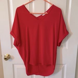 Selling a beautiful red lush blouse, size medium!